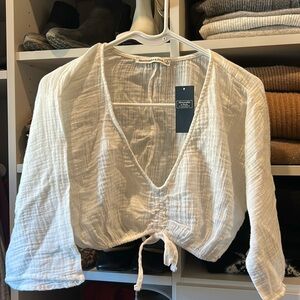 Abercrombie & Fitch white 
Gauze crop top size small
Cover up